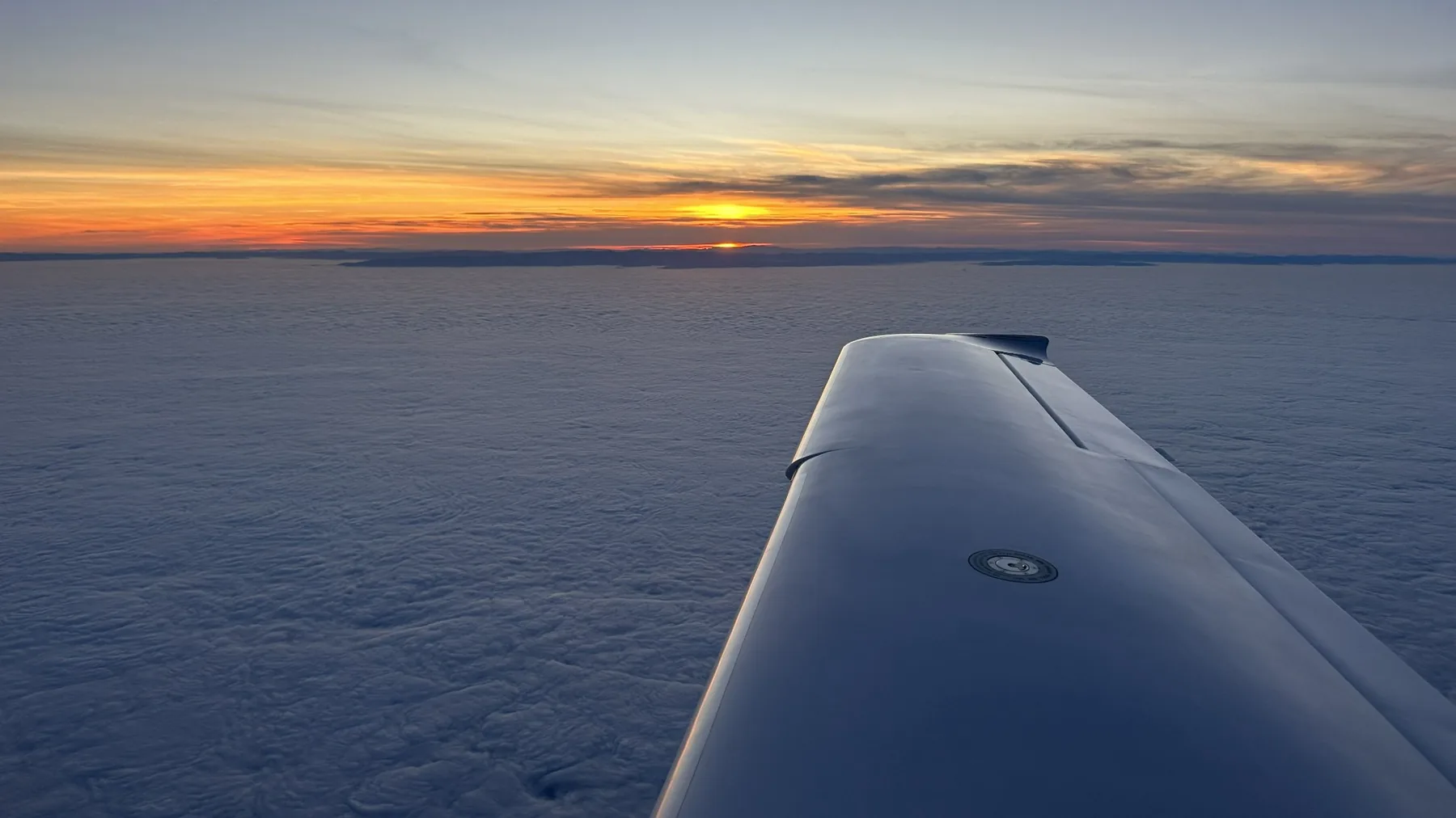 Cloud and sunset conditions on a scenic flight